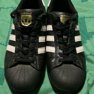 Adidas Superstars with Black and white strips